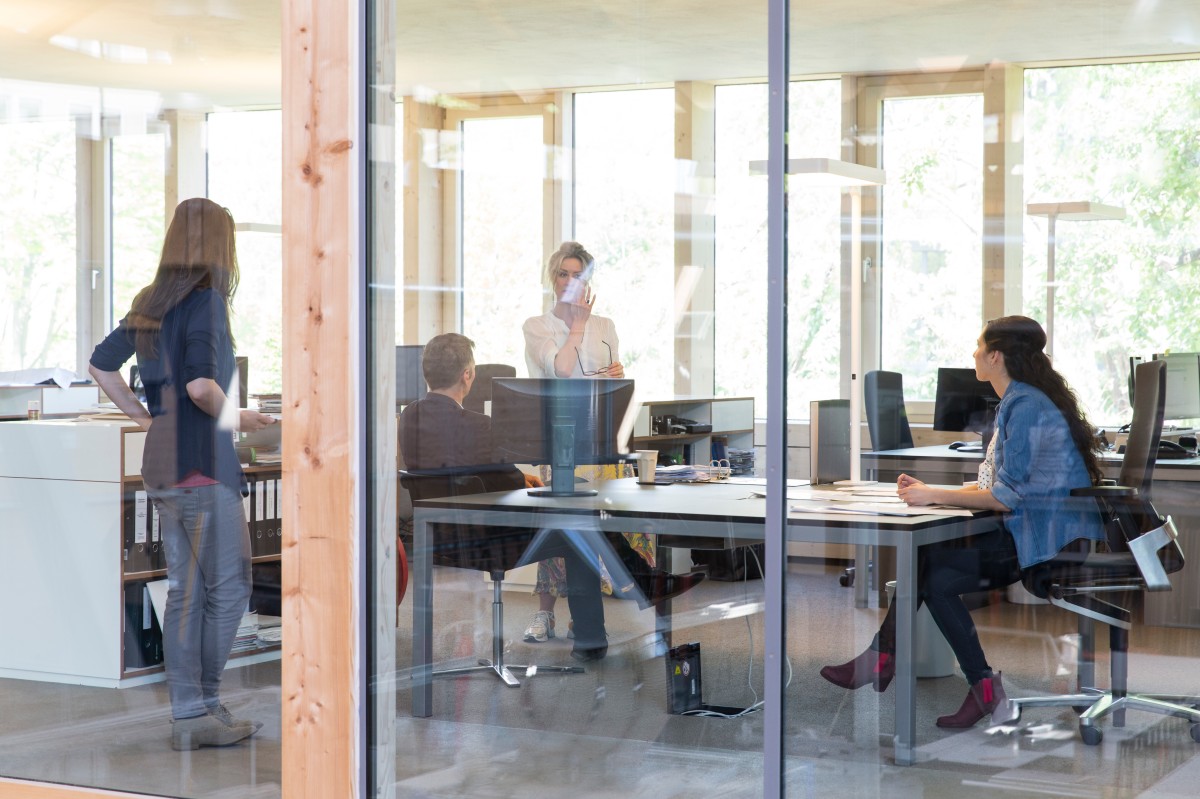 Team collaborating in a modern office